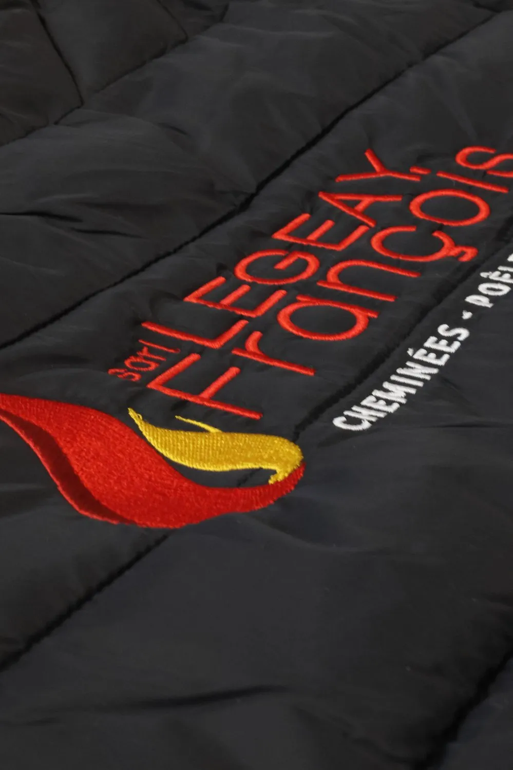 Broderie Flegeay François Cheminées — doudoune brodée